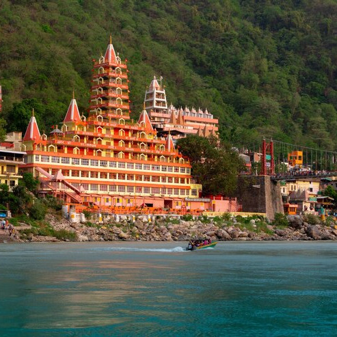 Snowy hill station with tourists on holiday