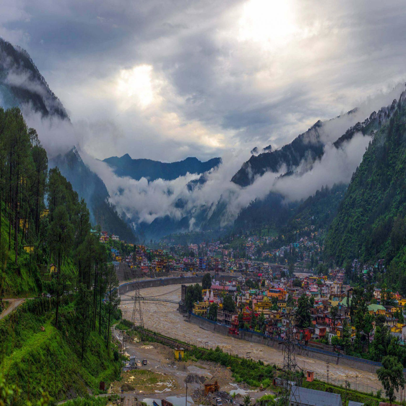 Snowy hill station with tourists on holiday