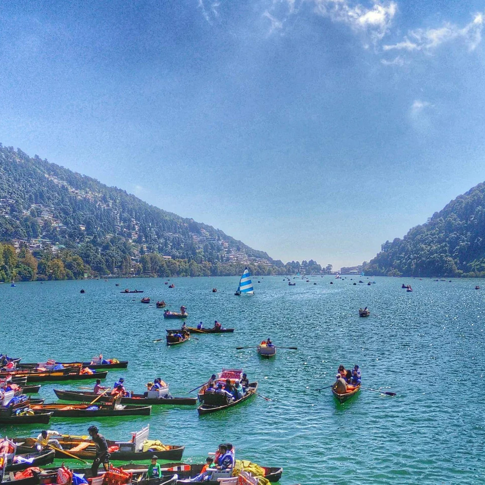 Snowy hill station with tourists on holiday
