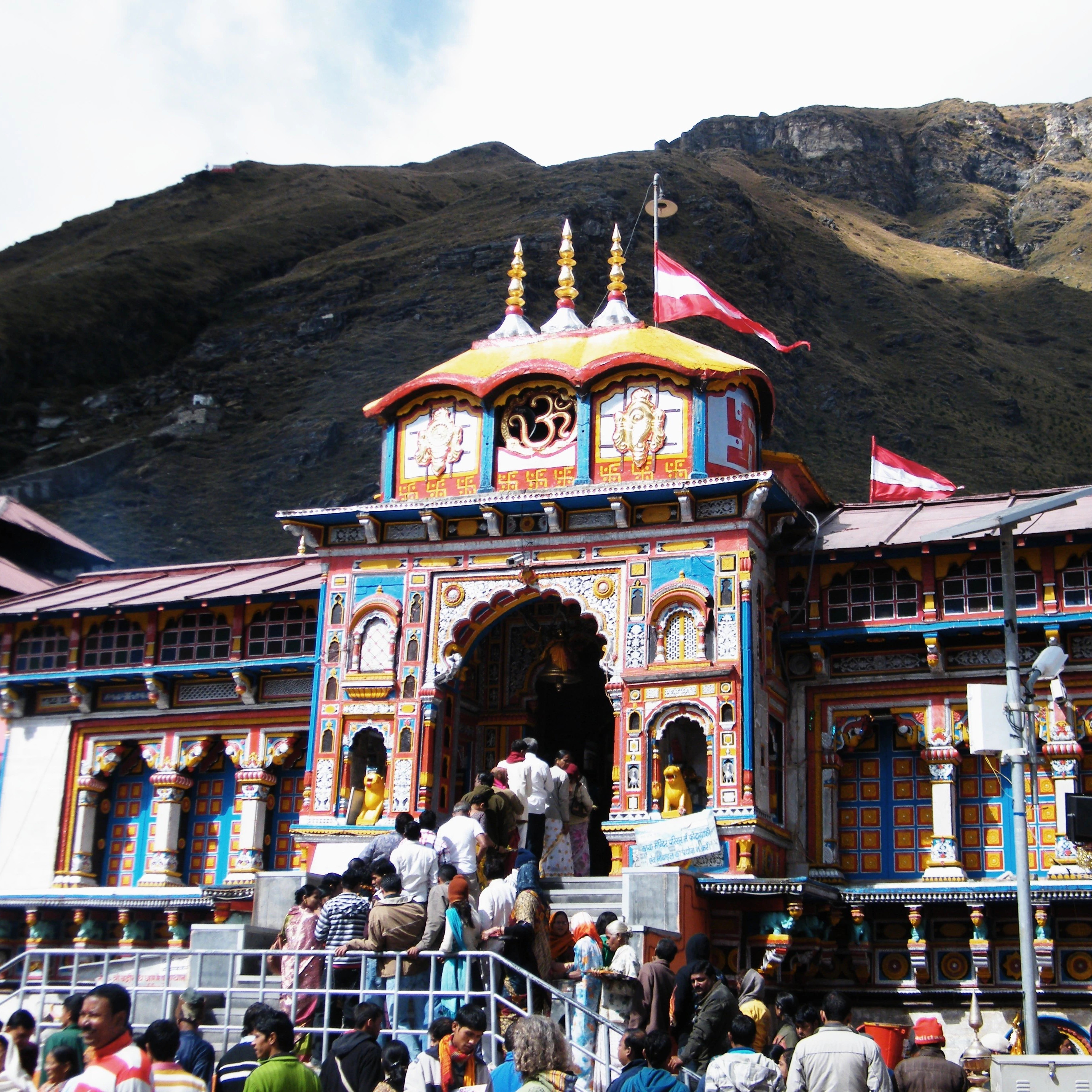 Snowy hill station with tourists on holiday