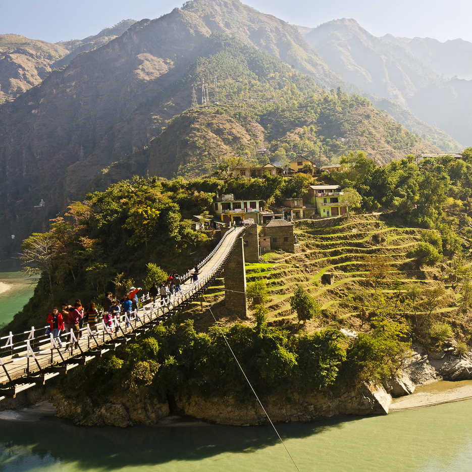 Snowy hill station with tourists on holiday