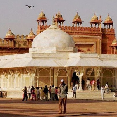 Snowy hill station with tourists on holiday